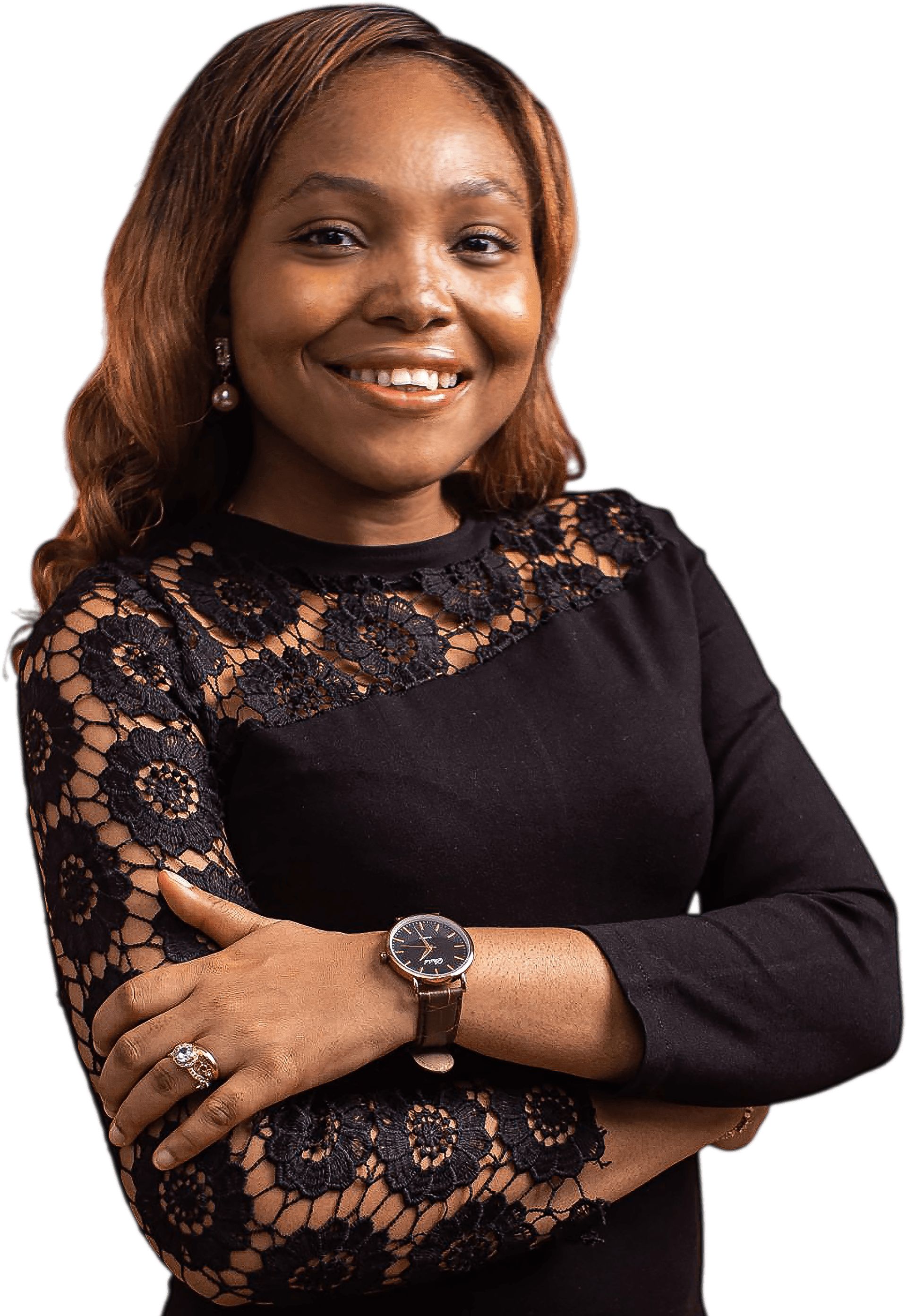 Dr. Ezinne Eigbe smiling, arms crossed, in a black lace dress